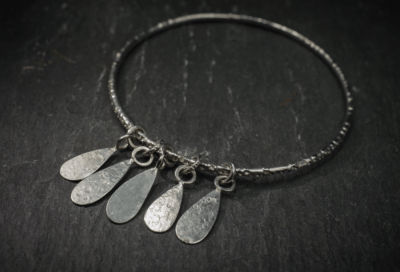 Gribbled Strand Narrow recycled silver Bangle with Teardrop charms