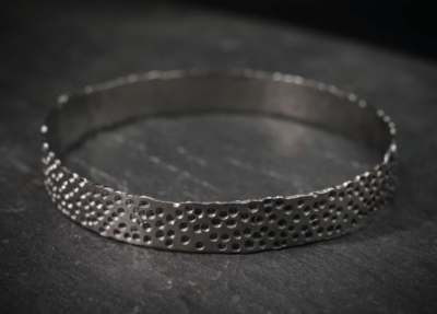 Wide handmade recycled silver hammered organic bangle with dots - Gribbled Bangle from shipwrecked range - Image 3