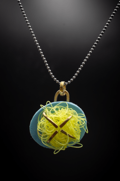 Modern and unique, beach plastic upcycled contemporary necklace pendant on silver ball chain, with brass. Yellow and Blue.